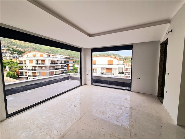 بالاقساط - شقق بتصاميم متنوعة -مجمع بتصميم انيق - في مركز الانيا