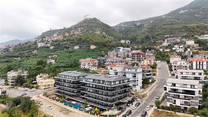 بالاقساط - شقق بتصاميم متنوعة -مجمع بتصميم انيق - في مركز الانيا