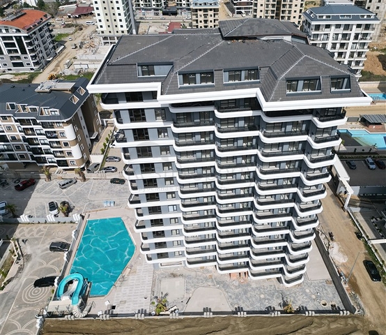 بالاقساط -شقق ضمن مجمع سكني قيد الانشاء في مهموتلار / الانيا 