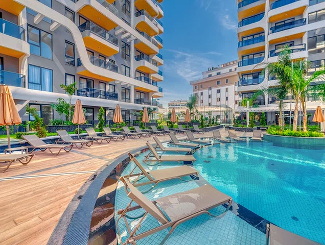 مشروع فاخر جديد مع موقف سيارات مغطى في منطقة توسمور