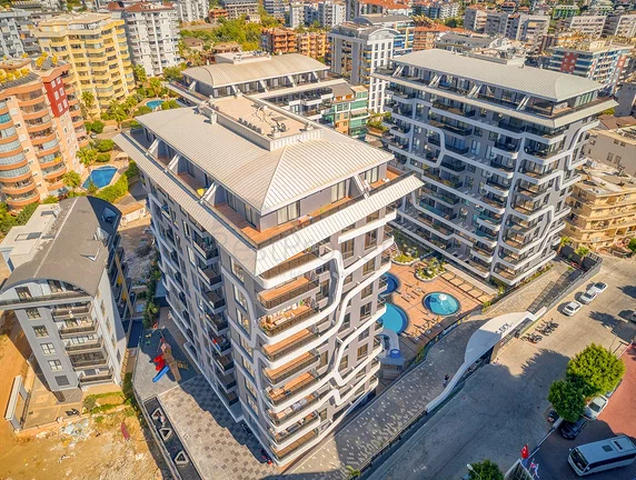 مشروع فاخر جديد مع موقف سيارات مغطى في منطقة توسمور