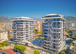 مشروع فاخر جديد مع موقف سيارات مغطى في منطقة توسمور