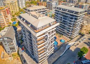 مشروع فاخر جديد مع موقف سيارات مغطى في منطقة توسمور