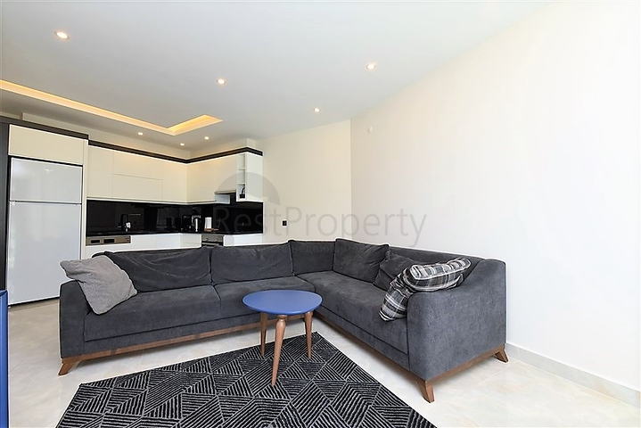 شقة 1+1 مطلة على البحر في مجمع متميز