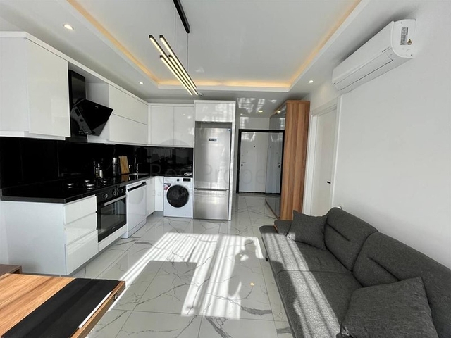 شقة 1+1 في وسط ألانيا في مبنى جديد