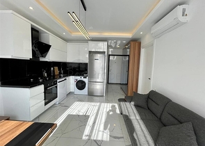 شقة 1+1 في وسط ألانيا في مبنى جديد