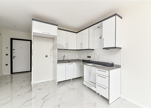 شقة 1+1 في منطقة مرموقة في أوبا