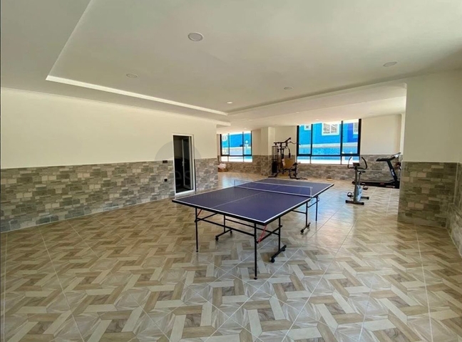 شقة غرفة وصالة -مجمع جديد - في مهموتلار / الانيا 