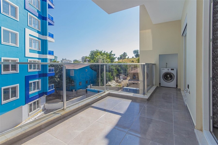 شقة غرفة وصالة -مجمع جديد - في مهموتلار / الانيا 