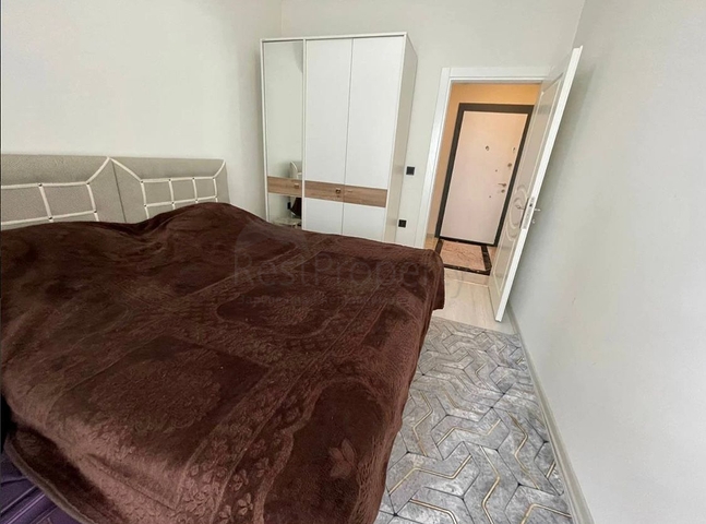 شقة غرفة وصالة -مجمع جديد - في مهموتلار / الانيا 