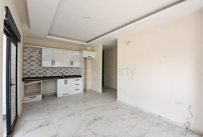 شقة 1+1 في مجمع جديد بدون بنية تحتية في منطقة محمودلار