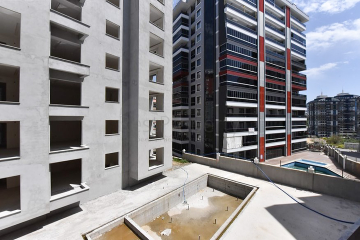 شقة 1+1 في مجمع جديد بدون بنية تحتية في منطقة محمودلار