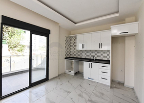 شقة 1+1 في مجمع جديد بدون بنية تحتية في منطقة محمودلار