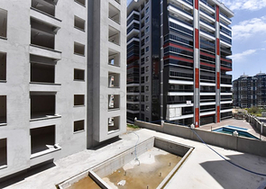 شقة 1+1 في مجمع جديد بدون بنية تحتية في منطقة محمودلار