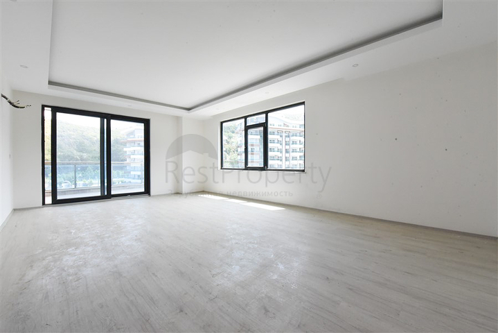 شقة 2+1 في منطقة كارجيجاك الخلابة ، على بعد 300 متر فقط من البحر