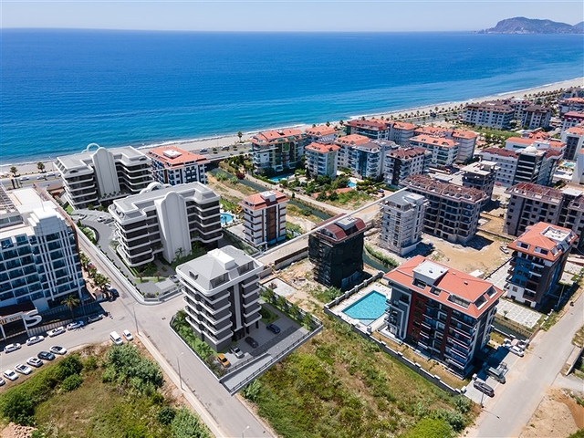 الفخامة والانسجام على الشاطئ. مشروع متميز على الساحل الأول