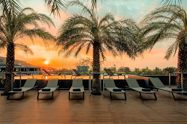 عمارات مع بنية تحتية فندقية بالقرب من شاطئ كامالا