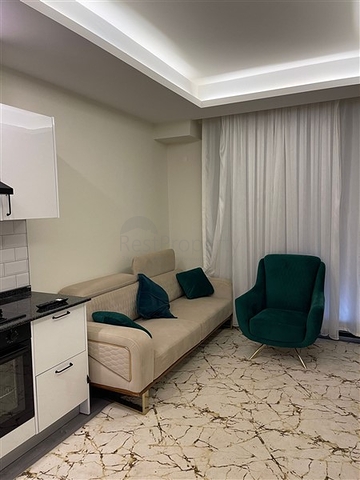 شقة 1+1 في مجمع جديد في غازي باشا ، على بعد 600 متر من البحر