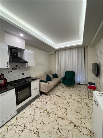 شقة 1+1 في مجمع جديد في غازي باشا ، على بعد 600 متر من البحر