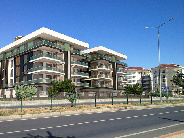 شقة بتخطيط5+1 في أحد المجمعات الفاخرة على الخط الأول من البحر في منطقة كاستل – ألانيا