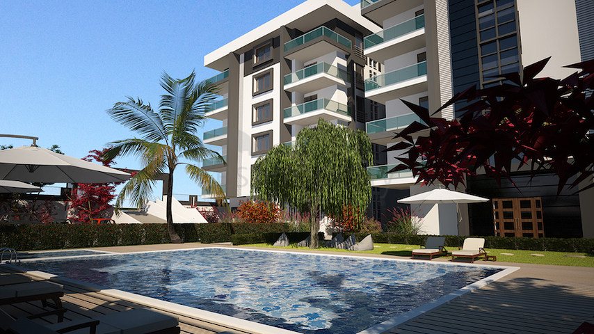 شقة بتخطيط5+1 في أحد المجمعات الفاخرة على الخط الأول من البحر في منطقة كاستل – ألانيا