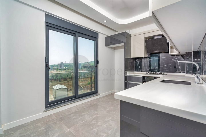 مشروع استثماري ، شقق 2 + 1 في كيبيز - منطقة أنطاليا 