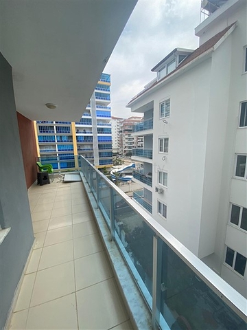 شقة غرفة وصالة مفروشة -ضمن مجمع سكني قريب من البحر والخدمات - في محمودلار / الانيا 