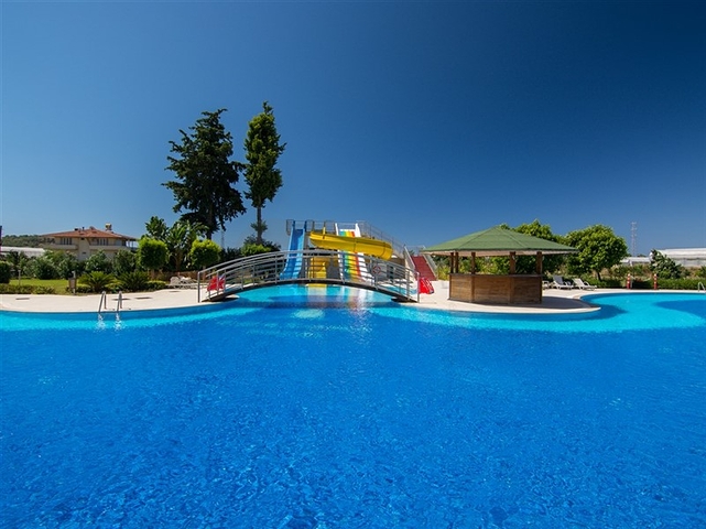 سعر مناسب - بين احضان الطبيعة -دوبلكس 2 غرفة وصالة -ضمن مجمع - في ديمرتاش / الانيا 