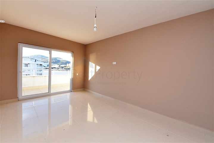 سعر مناسب - بين احضان الطبيعة -دوبلكس 2 غرفة وصالة -ضمن مجمع - في ديمرتاش / الانيا 