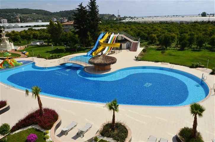 سعر مناسب - بين احضان الطبيعة -دوبلكس 2 غرفة وصالة -ضمن مجمع - في ديمرتاش / الانيا 