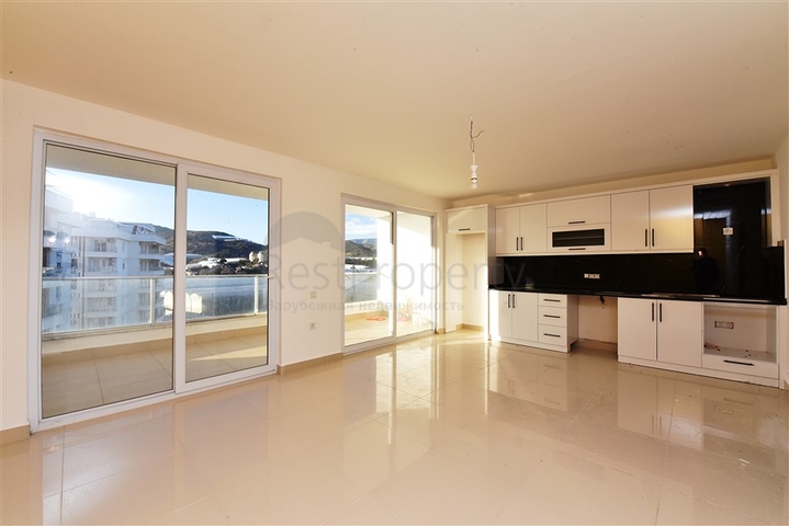 سعر مناسب - بين احضان الطبيعة -دوبلكس 2 غرفة وصالة -ضمن مجمع - في ديمرتاش / الانيا 