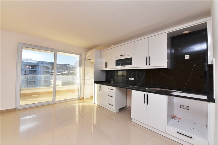 سعر مناسب - بين احضان الطبيعة -دوبلكس 2 غرفة وصالة -ضمن مجمع - في ديمرتاش / الانيا 