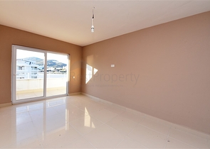 سعر مناسب - بين احضان الطبيعة -دوبلكس 2 غرفة وصالة -ضمن مجمع - في ديمرتاش / الانيا 