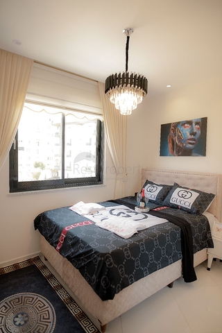 ضمن مجمع حديث يضم كافة الخدمات -شقة 1+1 - في مهموتلار / الانيا 