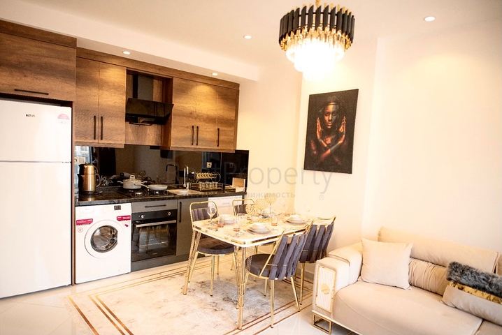 ضمن مجمع حديث يضم كافة الخدمات -شقة 1+1 - في مهموتلار / الانيا 