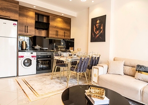 ضمن مجمع حديث يضم كافة الخدمات -شقة 1+1 - في مهموتلار / الانيا 