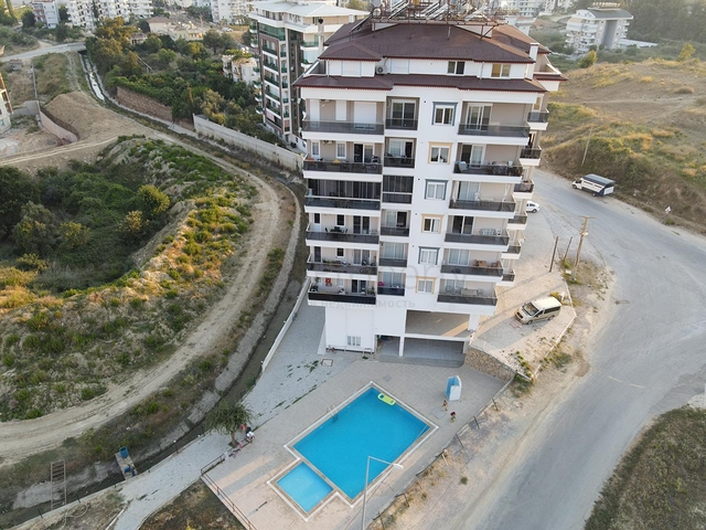 شقة انيقة -تصميم 2 غرفة وصالة -مطبخ منفصل - في افسلار / الانيا 