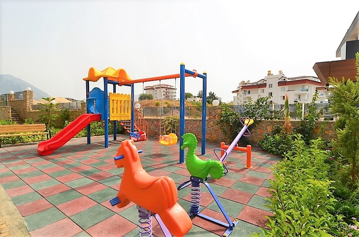 دوبلكس لعائلة كبيرة مع إمكانية الوصول إلى الحديقة