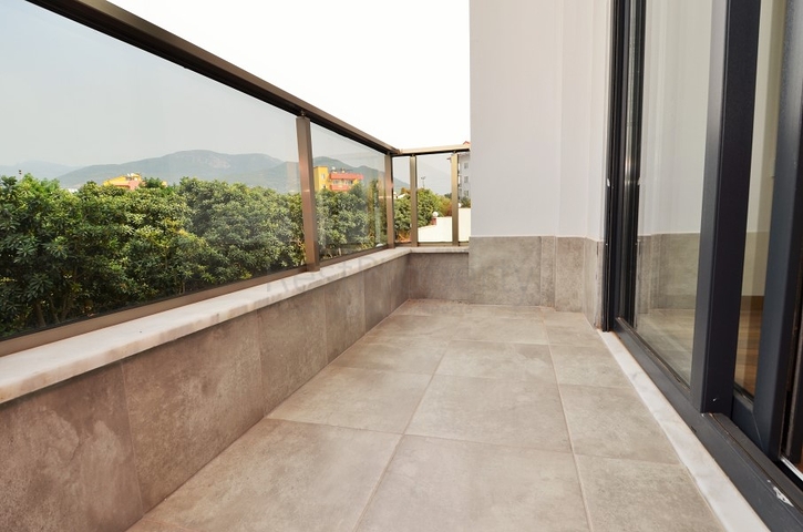 دوبلكس لعائلة كبيرة مع إمكانية الوصول إلى الحديقة