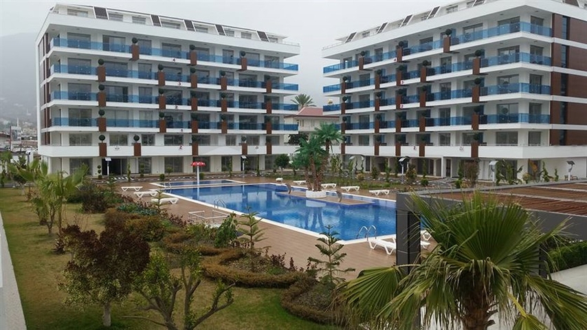 مجمع سكني حديث من قبل شركة البناء في منطقة كاستل – ألانيا