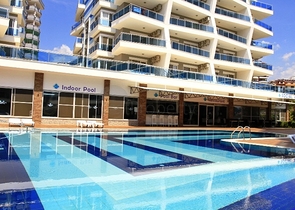 تصاميم مختلفة - دوبلكس غرفتين وصالة ضمن مجمع خمس نجوم في اوبا / الانيا 