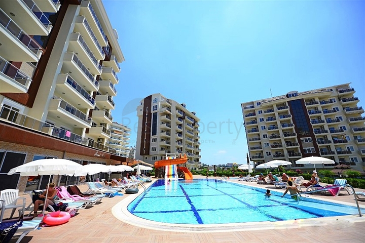 شقة بتخطيط 1+1 ضمن مجمع فاخر بسعر مغري في منطقة أفسلار – ألانيا