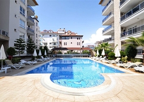 شقق سكنية ضمن مجمع سكني في منطقة كاستل الهادئة من مدينة ألانيا الساحلية