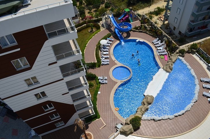 شقق عائلية ضمن مجمع سكني في افسلار / الانيا 