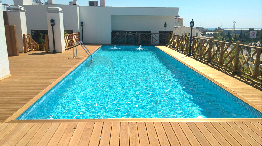 شقق بتصاميم مختلفة ضمن مجمع سكني عصري في أنطاليا