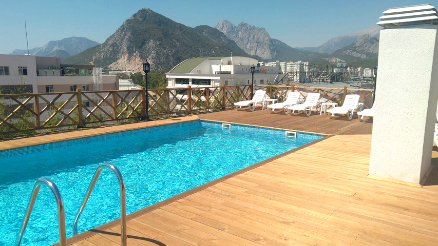 شقق بتصاميم مختلفة ضمن مجمع سكني عصري في أنطاليا