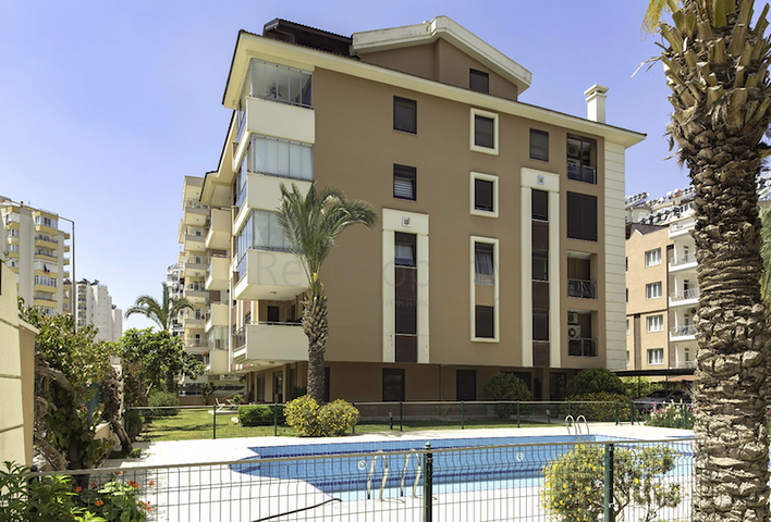 شقة بتخطيط 2+1 في حي كالجان من منطقة لارا – أنطاليا