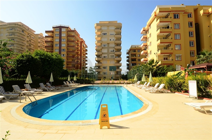 شقة مفروشة على الخط الأول من البحر بإطلالة ساحرة لاتوصف في منطقة محمودلار – ألانيا