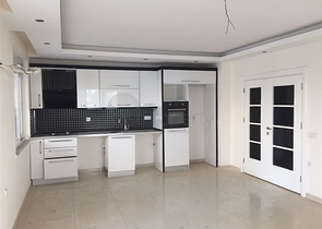 شقة بتخطيط 2+1 بسعر مناسب في منطقة محمودلار – ألانيا