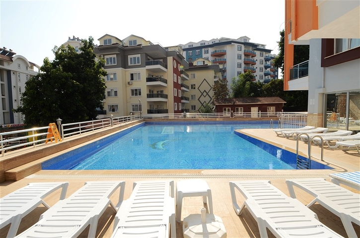 شقة بتخطيط 1+1 في منطقة توسمور – ألانيا